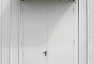 Ocelová vrata s vloženými dveřmi